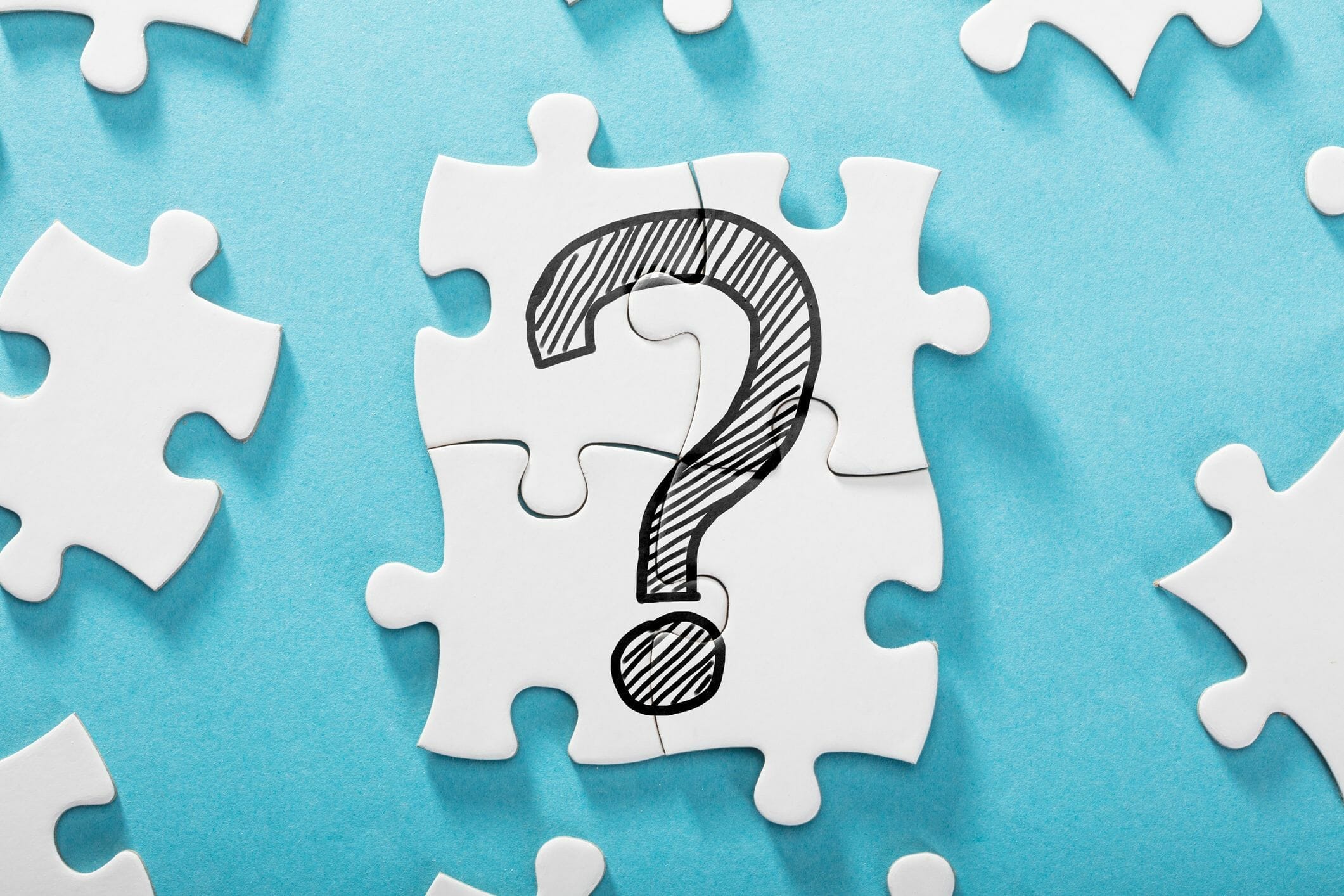 What are questions anyway? An image of a question mark with puzzle pieces. | Xseed Lead
