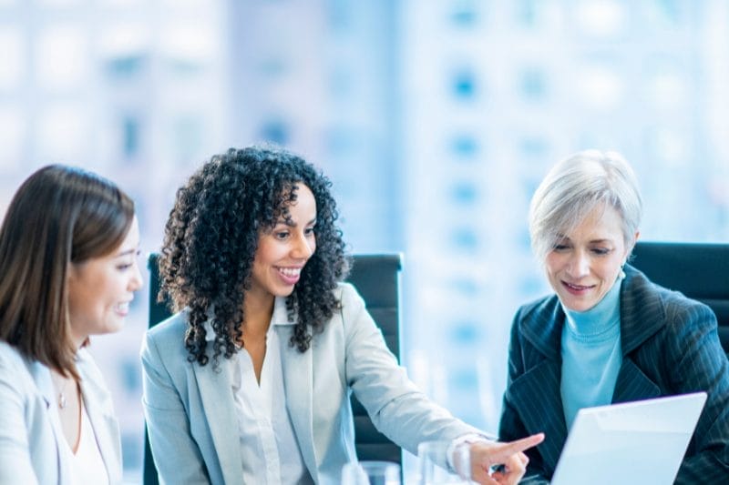 Two men collaborating on an Aid Development project with Xseed Lead, emphasising sustainability and inclusivity.